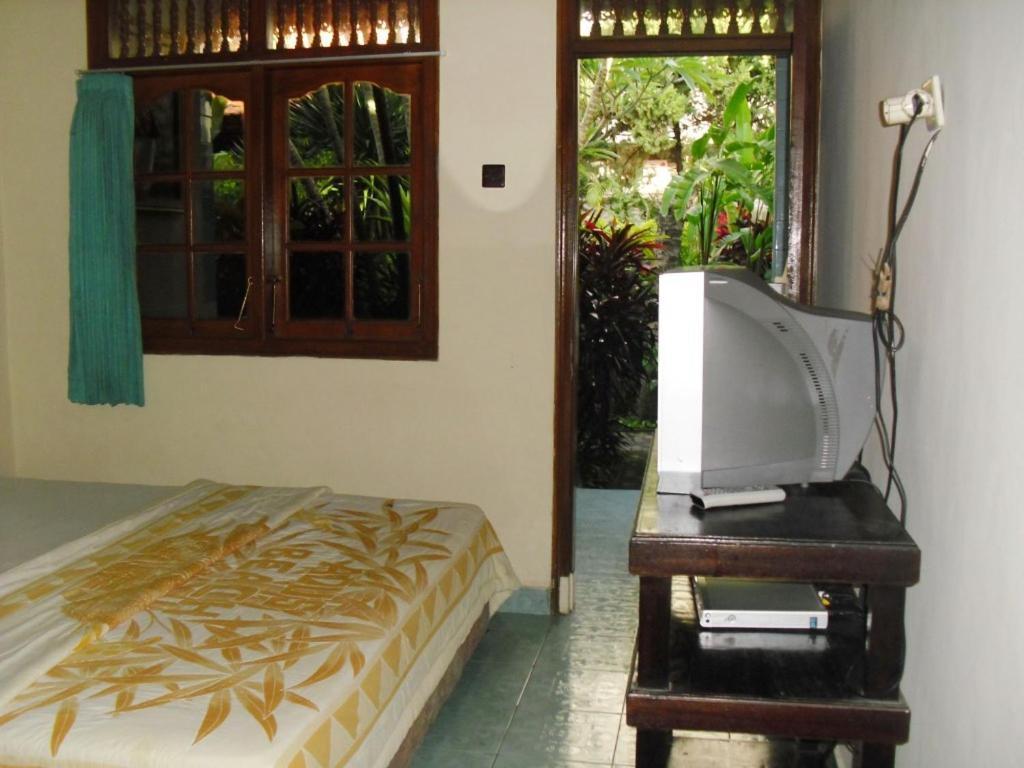 Adus Beach Inn Legian Habitación foto